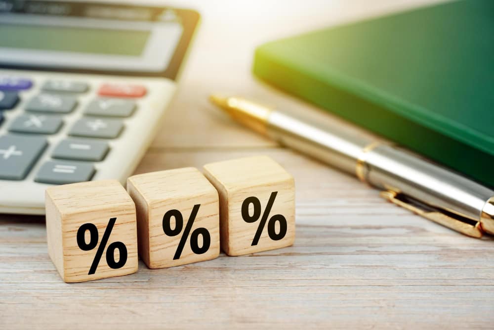 three percentile dice on a table