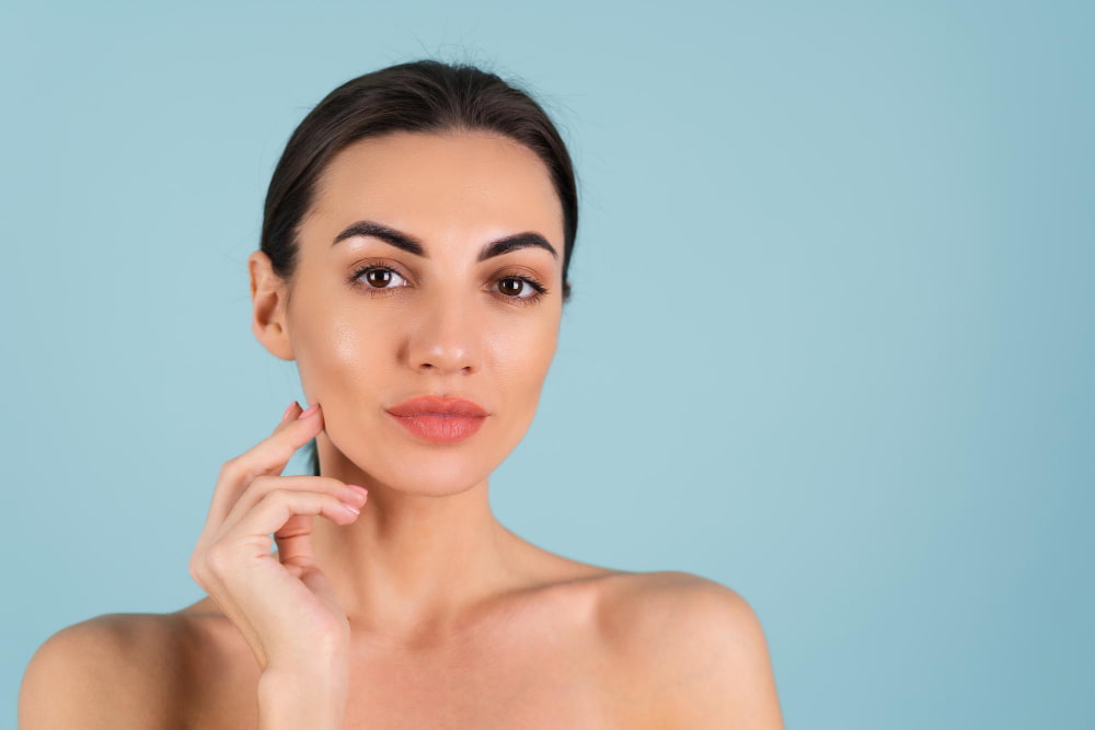 young girl with cream to highlight cheekbones