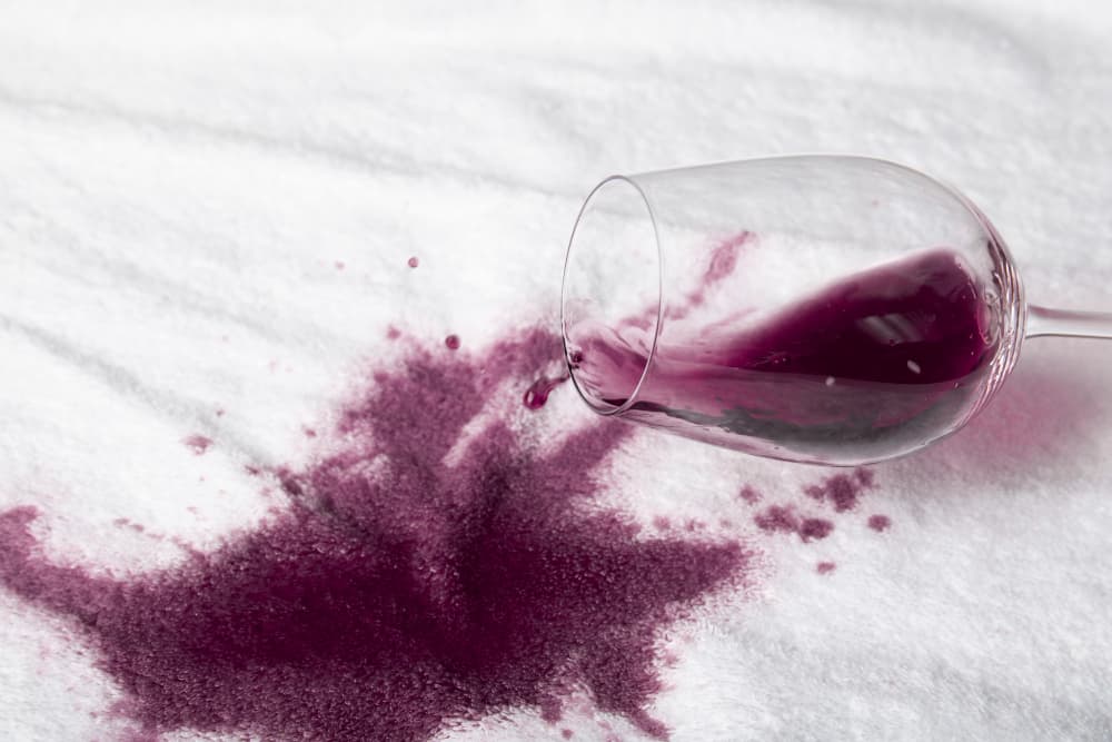 fallen glass leaving wine stains